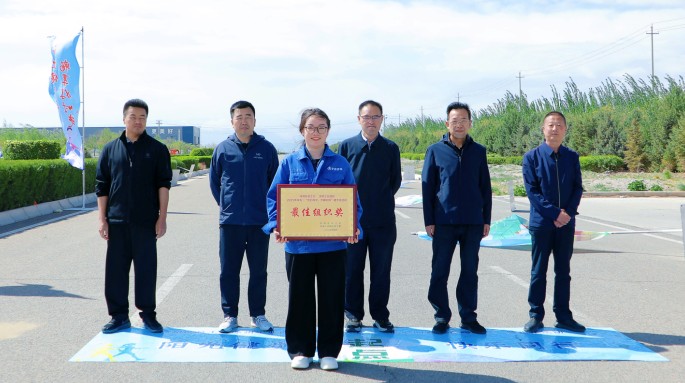新能源公司組織職工參加武威涼州工業(yè)園區(qū)“匠心向黨 步履不?！甭毠そ〔阶呋顒?dòng)